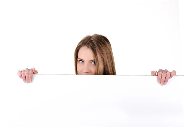 Teenage woman holding white banner — Stock Photo, Image