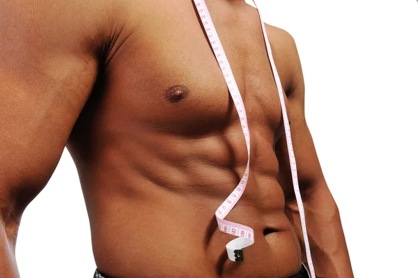 El hombre muscular está siendo medido — Foto de Stock