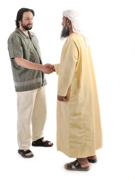 Árabe muçulmano empresário apertando as mãos — Fotografia de Stock