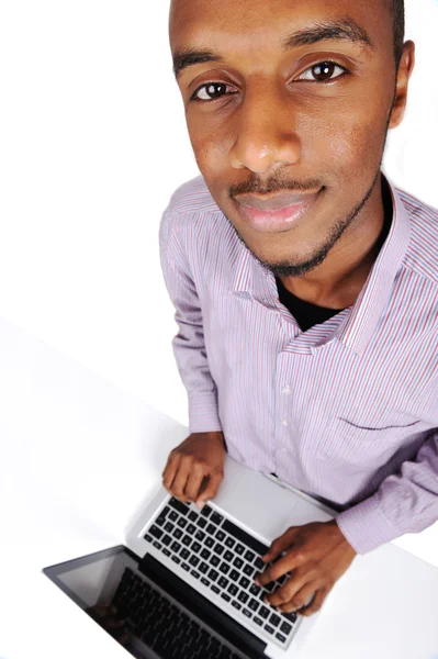 Молодий студент з ноутбуком — стокове фото