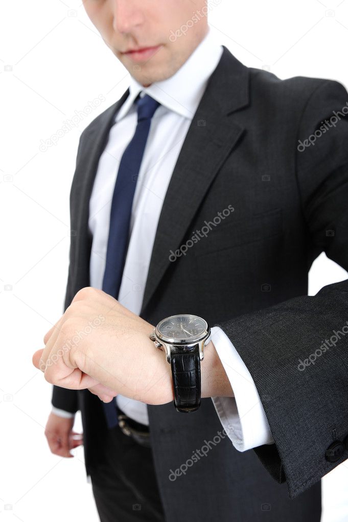 Business man looking on his watch
