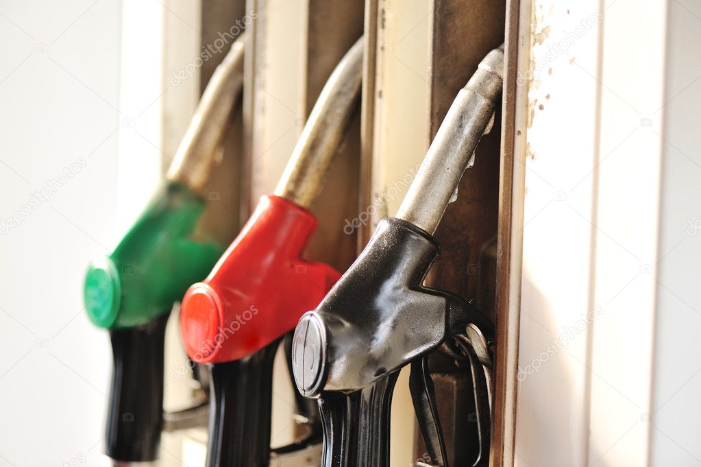 Three gas pump nozzles