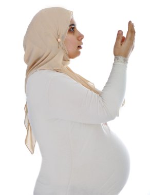 Arabic Muslim pregnant woman praying clipart