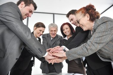 Group of business with hands together for unity and partnership clipart
