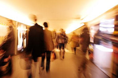 Crowd walking in the city at night clipart