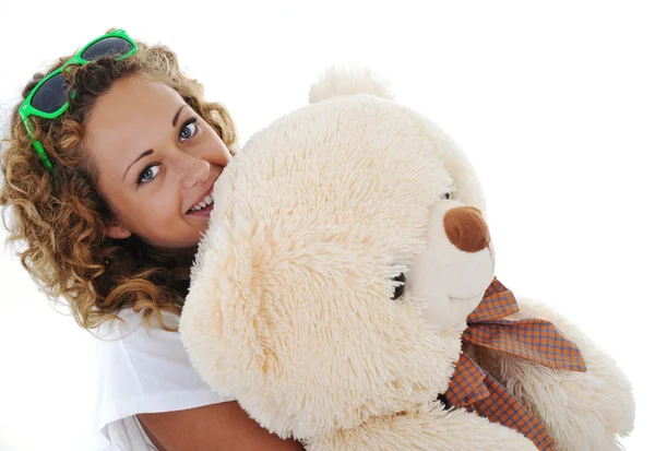 Tienermeisje houden een teddybeer (geen naam of handelsmerk) — Stockfoto