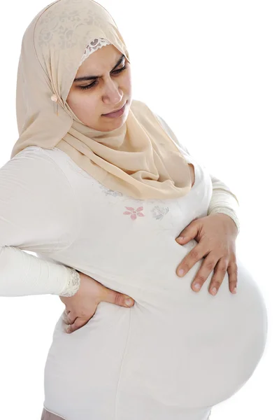 Muslim arabic pregnant woman with pain in back — Stock Photo, Image