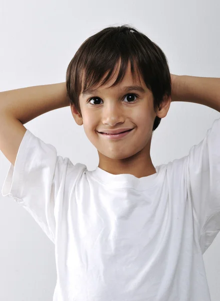 Miúdo sorridente de sete anos — Fotografia de Stock