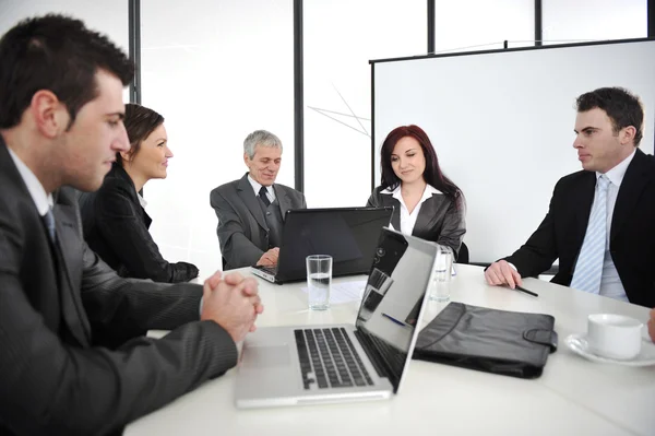 Empresários que têm uma reunião de negócios — Fotografia de Stock