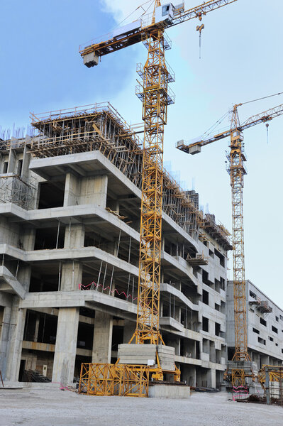 Construction site with crane and building