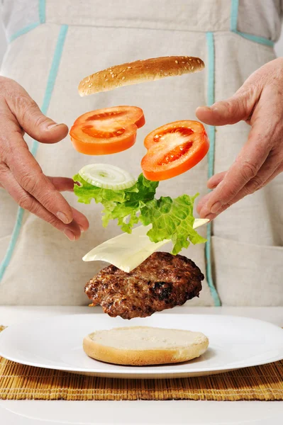 Conceptual making of burger — Stock Photo, Image