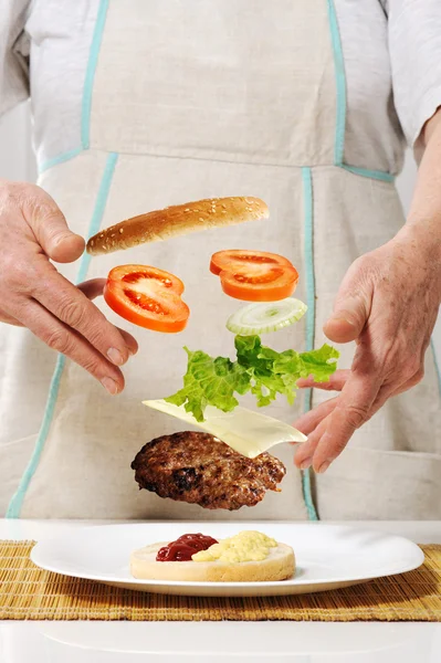 Making hamburger ingredients concept — Stock Photo, Image