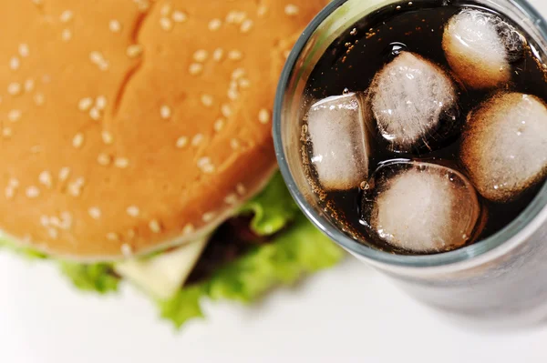 Cola with ice and burger — Stock Photo, Image