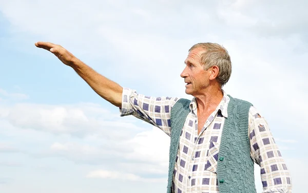 Senior male person making gestures — Stock Photo, Image