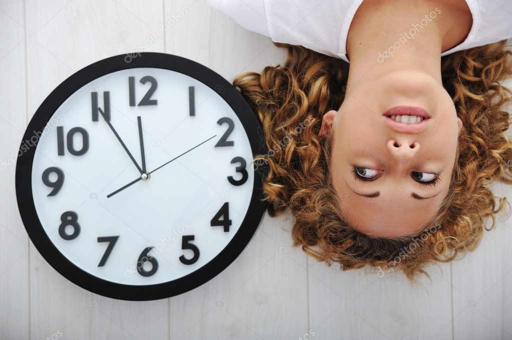 Blonde girl and clock