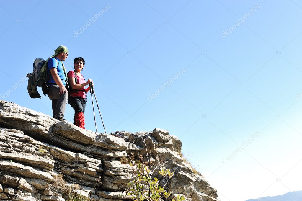 Couple on the top of mountain
