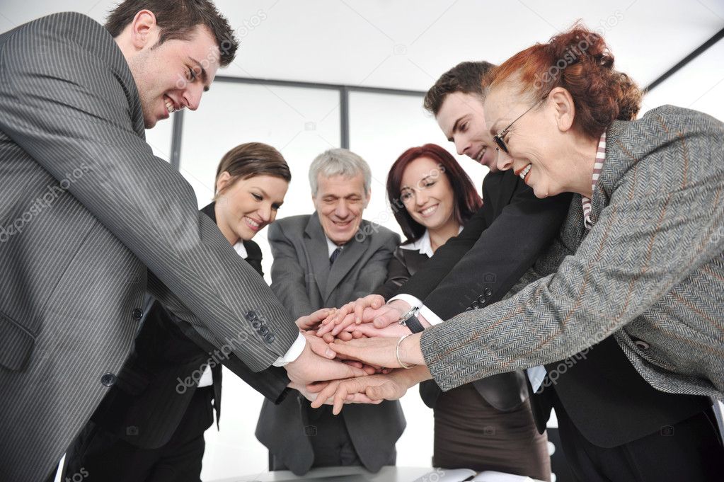 Group of business with hands together for unity and partnership