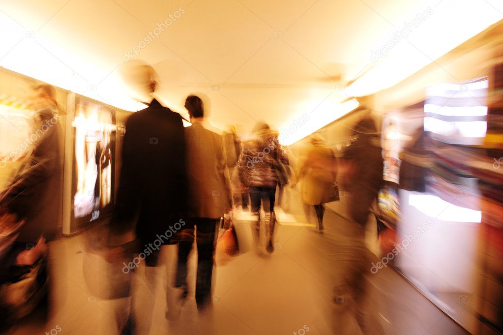 Crowd walking in the city at night
