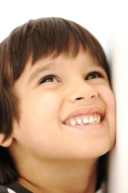 Happy boy with long hair outdoor, summertime clipart