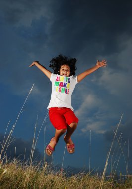 Little girl on meadow, with 