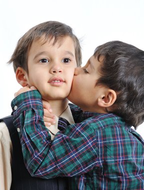 Happy children with fashionable clothes isolated