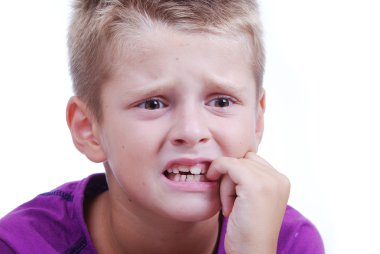 Stress expression on little blond kid's face clipart