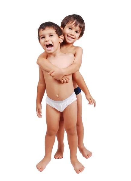 Dois meninos muito bonitos sem camisas em roupa interior — Fotografia de Stock