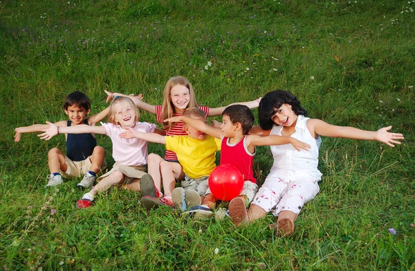 Small happy little group of children outdoor — Stock Photo, Image