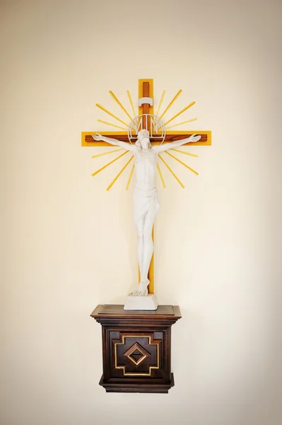 Jesus Christ on cross, wall in church — Stock Photo, Image