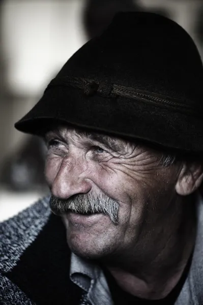 Portrait of old man with mustache, aged photo — Stock Photo, Image