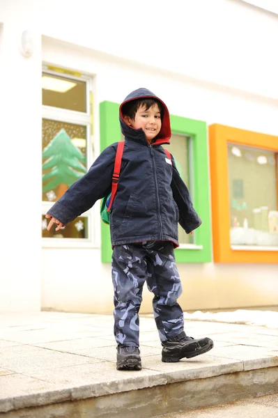 Little cute preschool child with bag on his back — Stock Photo, Image