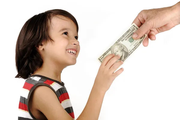Menino recebendo dinheiro de adulto — Fotografia de Stock