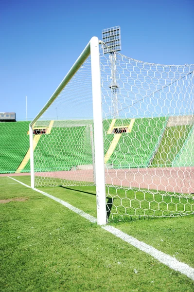 Goal net and white line in a soccer field on stadium — Stock Photo, Image
