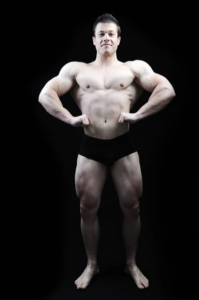 Το τέλειο αρσενικό σώμα - φοβερό bodybuilder που παρουσιάζουν — Φωτογραφία Αρχείου