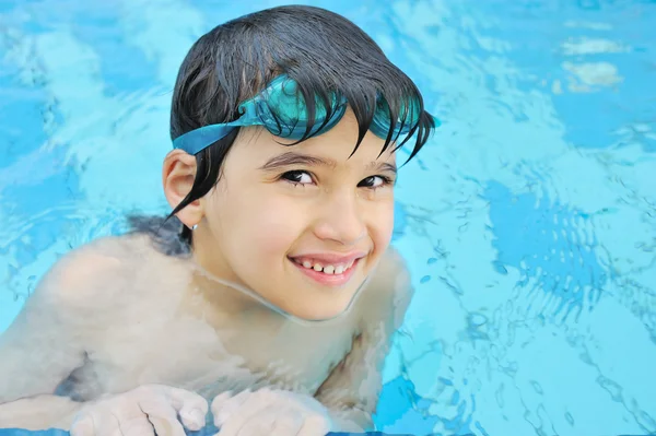 Summertime and swimming activities for happy children on the pool — Stock Photo, Image