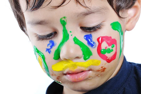 Niño con la cara pintada — Foto de Stock