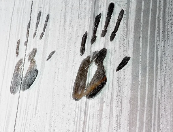 Handprints on the glass — Stock Photo, Image