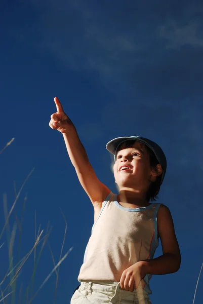 Little boy on meadow, before sunset — Stock Photo, Image