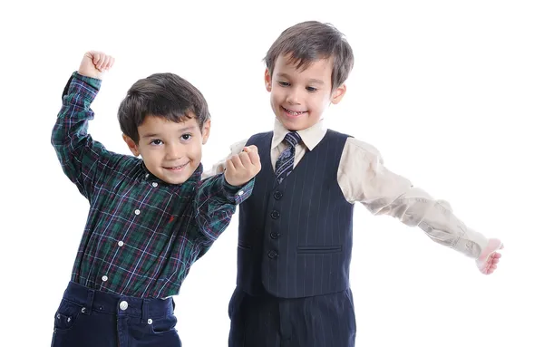 Glückliche Kinder mit modischer Kleidung isoliert — Stockfoto