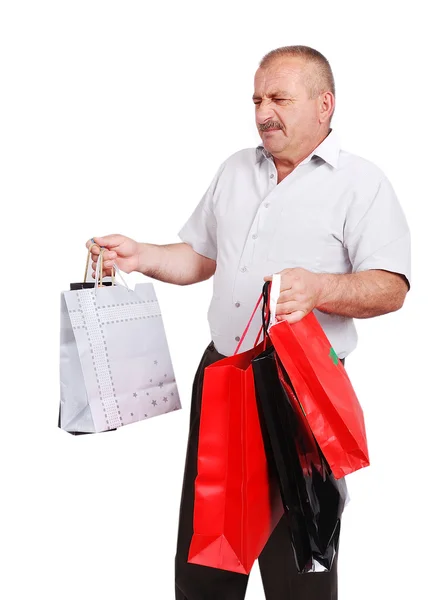 Ηλικιωμένος άνδρας λευκό με τσάντες για ψώνια — Φωτογραφία Αρχείου