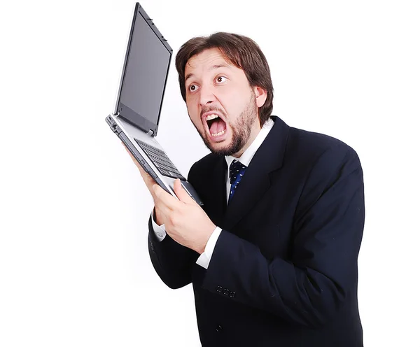 Modelo masculino jovem com laptop como um telefone — Fotografia de Stock
