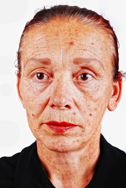Seniorin mit altem Gesicht — Stockfoto