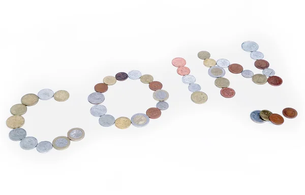 Wiele monet utworzone słowo moneta na białym tle — Zdjęcie stockowe