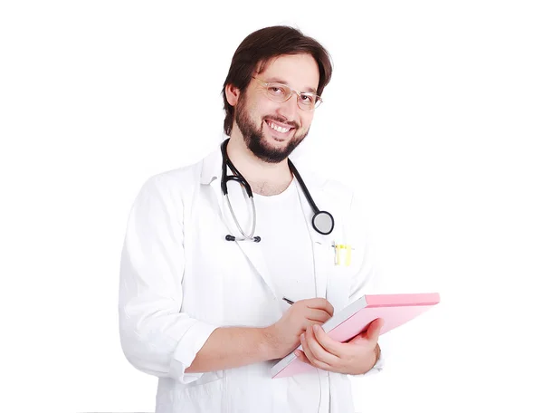 Young male doctor is preparing a receipt — Stock Photo, Image