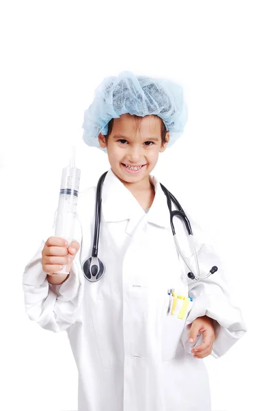 Маленький милый мальчик в докторской одежде — стоковое фото