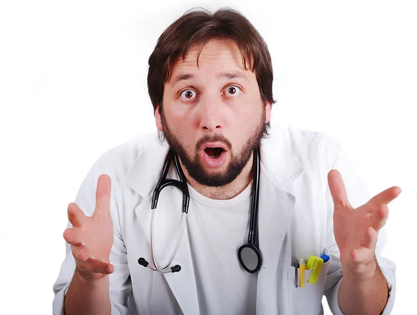 Jovem médico do sexo masculino com rosto muito surpreso — Fotografia de Stock