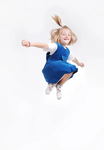 Heureux enfant saute haut, isolé — Photo