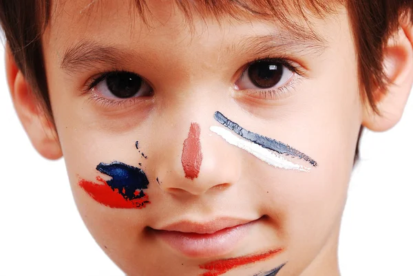 Aranyos kisgyerek arcán színekkel — Stock Fotó