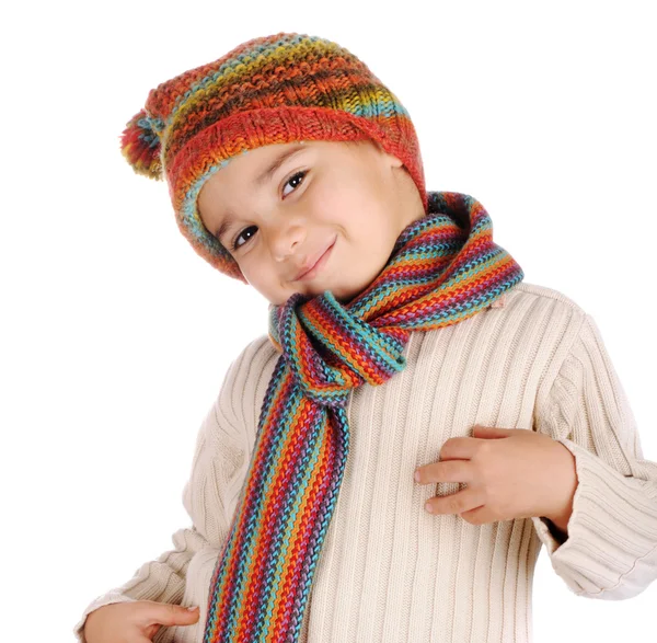Cute kid with winter clothes isolated in studio Stock Photo