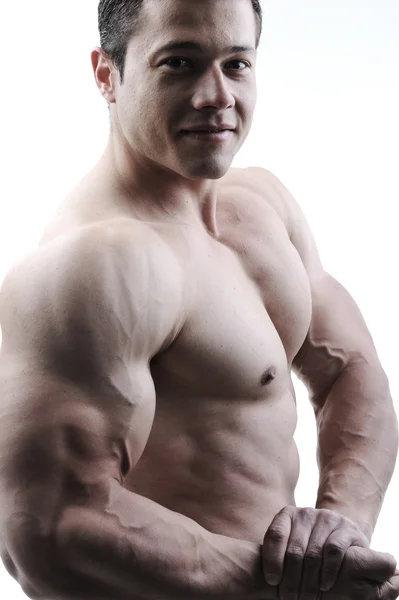 O corpo masculino perfeito - Impressionante fisiculturista posando Imagem De Stock